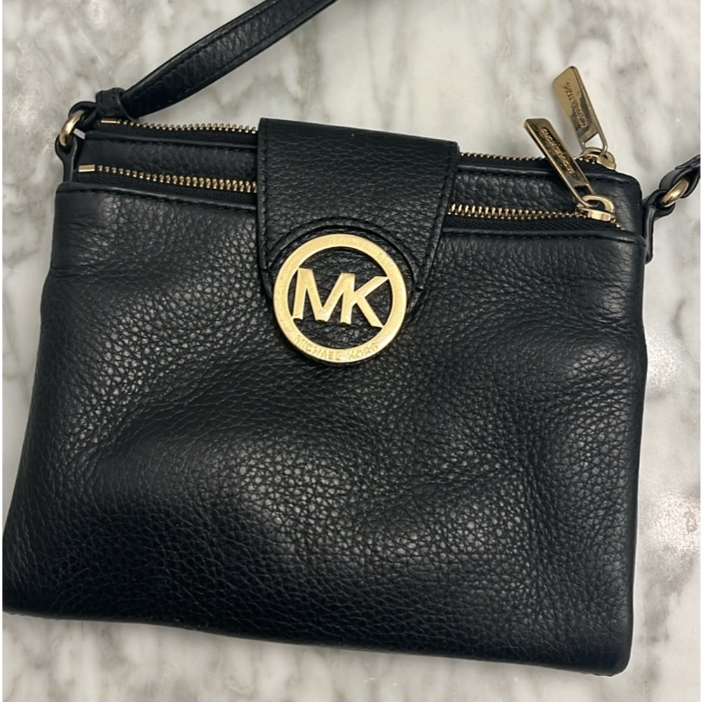 Micheal Kors black and gold crossbody bag